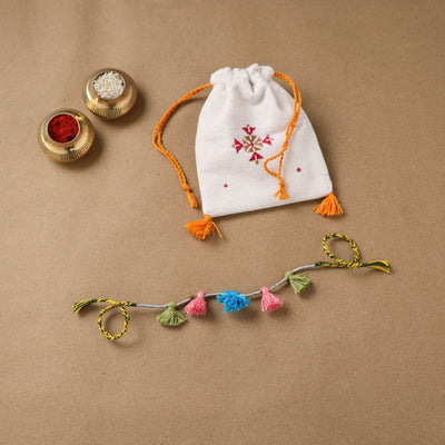 Anant Raksha Thread Work Rakhi with Soof Hand Embroidered Potli 22