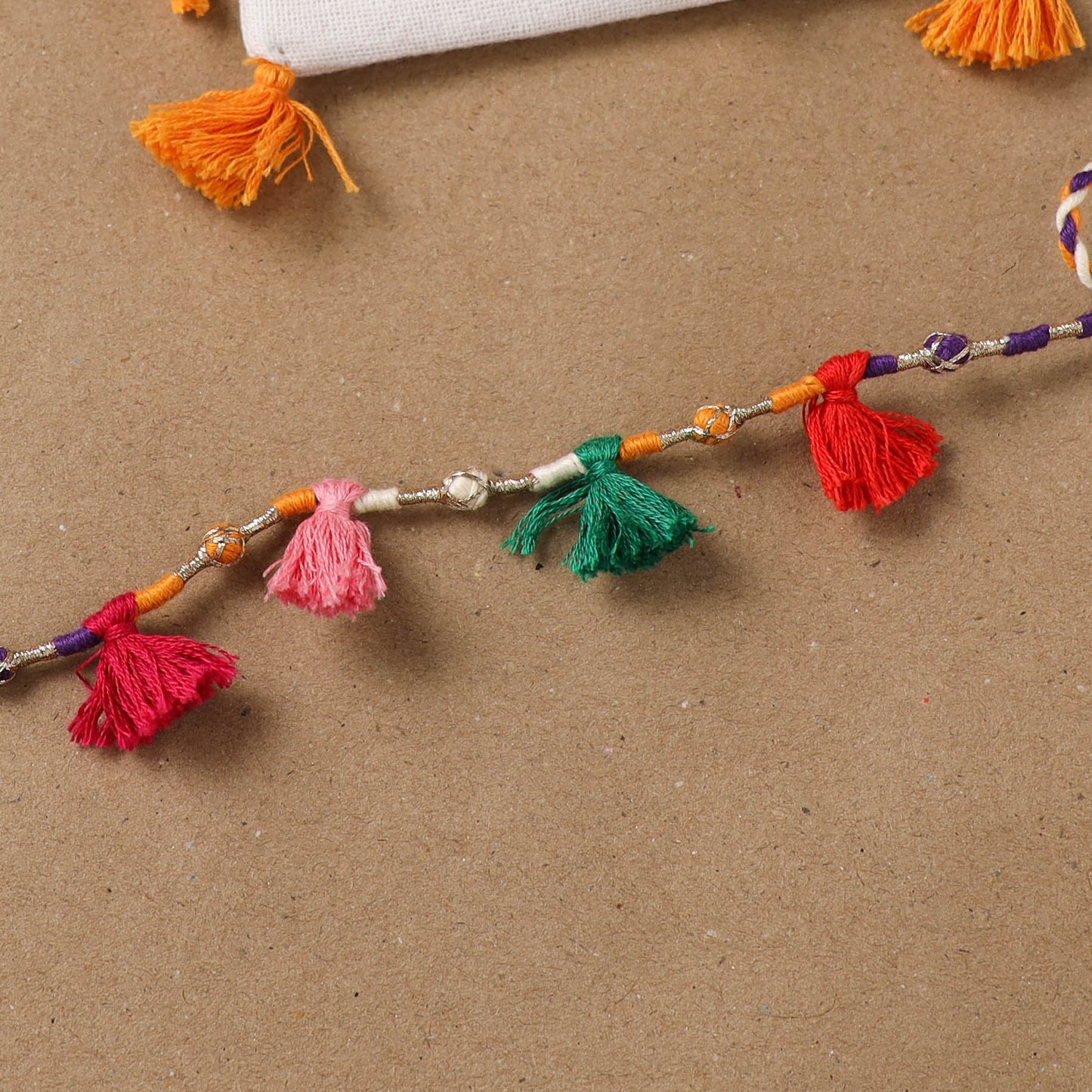 Anant Raksha Thread Work Rakhi with Soof Hand Embroidered Potli 23