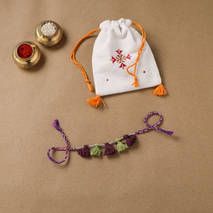 Anant Raksha Thread Work Rakhi with Soof Hand Embroidered Potli 24