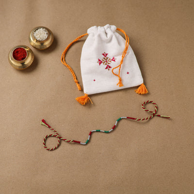 Anant Raksha Thread Work Rakhi with Soof Hand Embroidered Potli 25