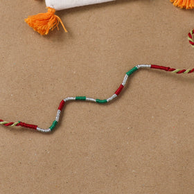 Anant Raksha Thread Work Rakhi with Soof Hand Embroidered Potli 25