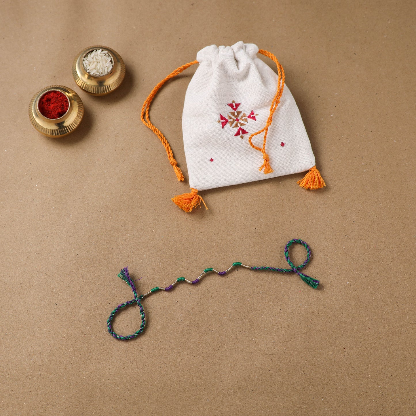 Anant Raksha Thread Work Rakhi with Soof Hand Embroidered Potli 26