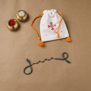 Anant Raksha Thread Work Rakhi with Soof Hand Embroidered Potli 26