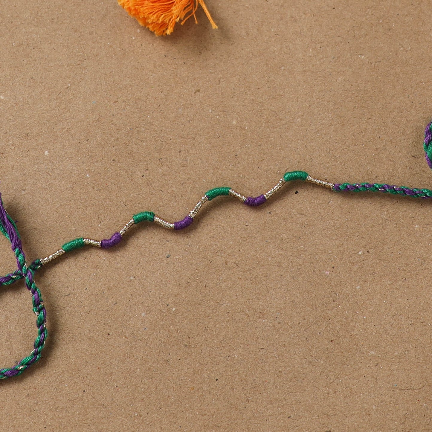 Anant Raksha Thread Work Rakhi with Soof Hand Embroidered Potli 26