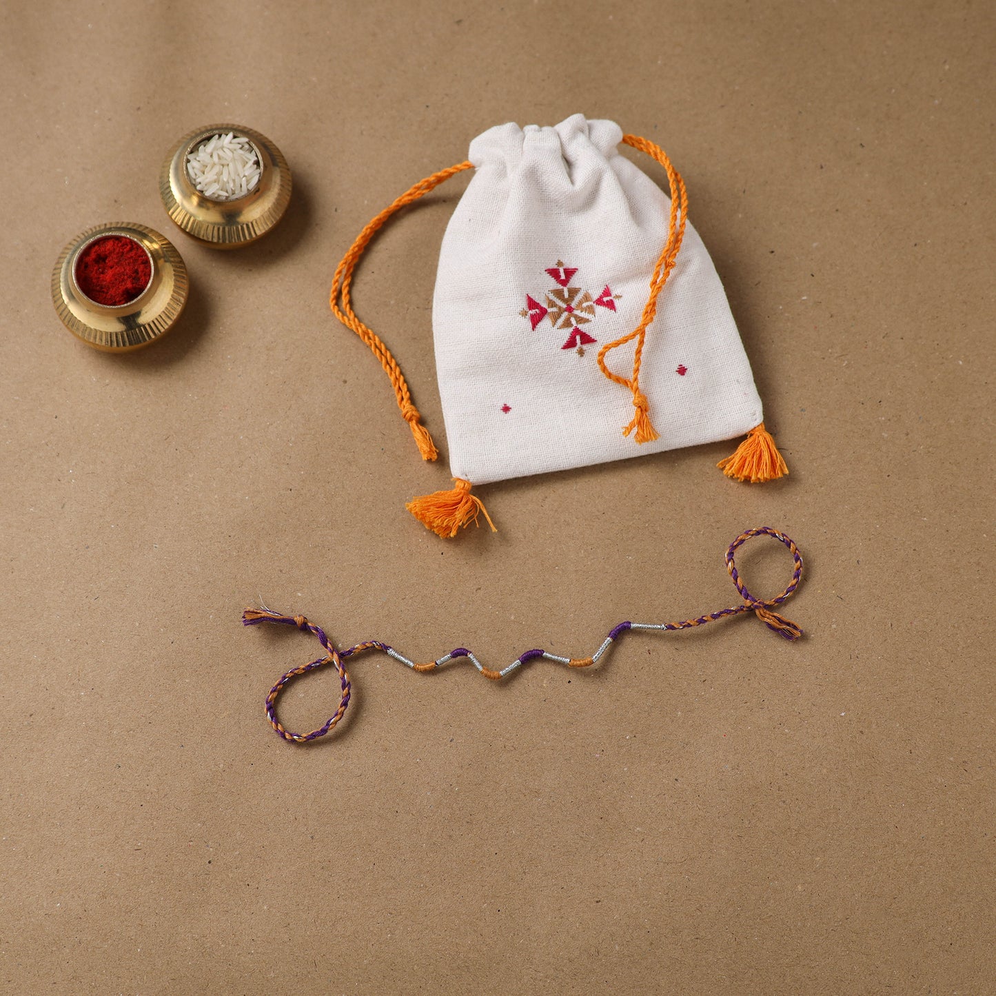 Anant Raksha Thread Work Rakhi with Soof Hand Embroidered Potli 27
