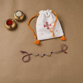 Anant Raksha Thread Work Rakhi with Soof Hand Embroidered Potli 27