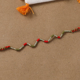 Anant Raksha Thread Work Rakhi with Soof Hand Embroidered Potli 28