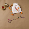 Anant Raksha Thread Work Rakhi with Soof Hand Embroidered Potli 30