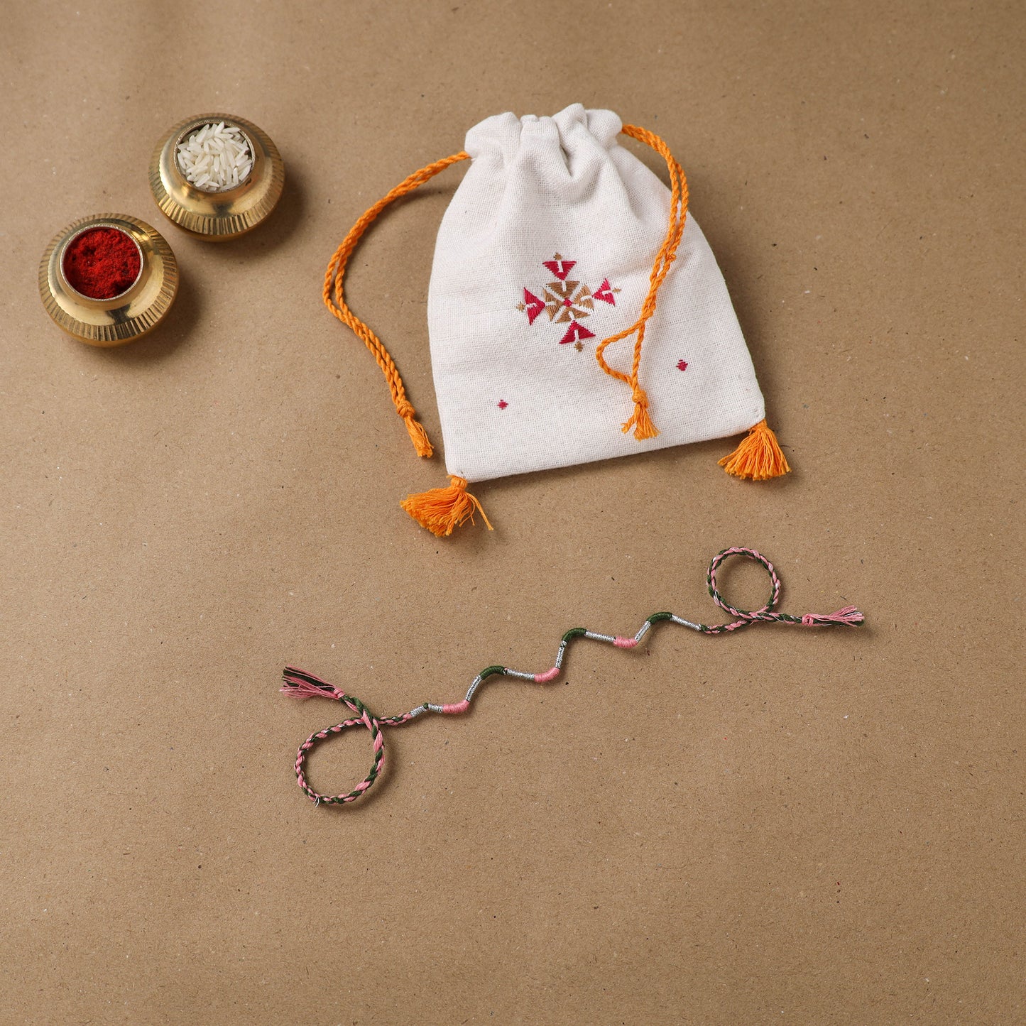Anant Raksha Thread Work Rakhi with Soof Hand Embroidered Potli 30