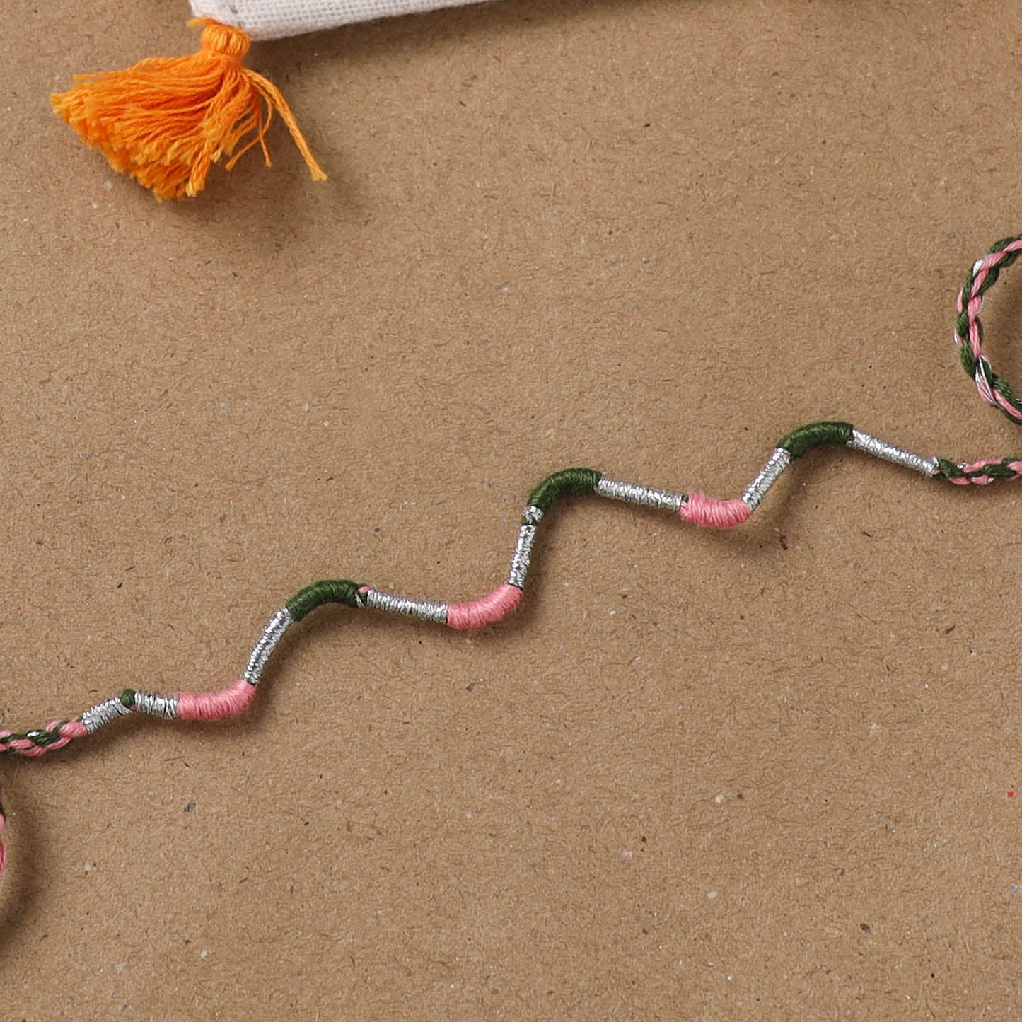 Anant Raksha Thread Work Rakhi with Soof Hand Embroidered Potli 30
