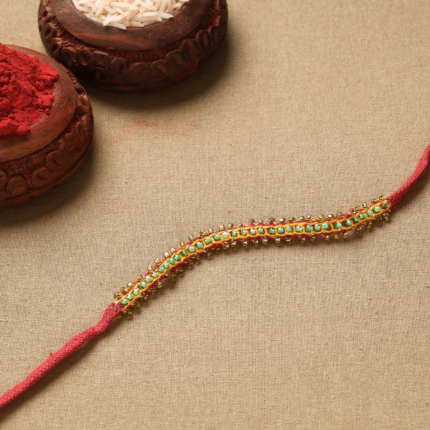 Buy Hand Embroidered Beadwork Leaf Sequin Rakhi Online at iTokri.com