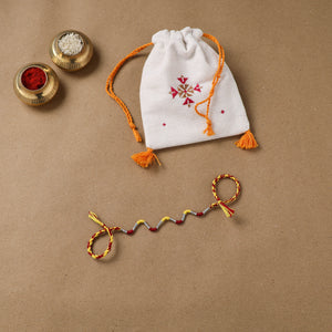 Anant Raksha Thread Work Rakhi with Soof Hand Embroidered Potli 31