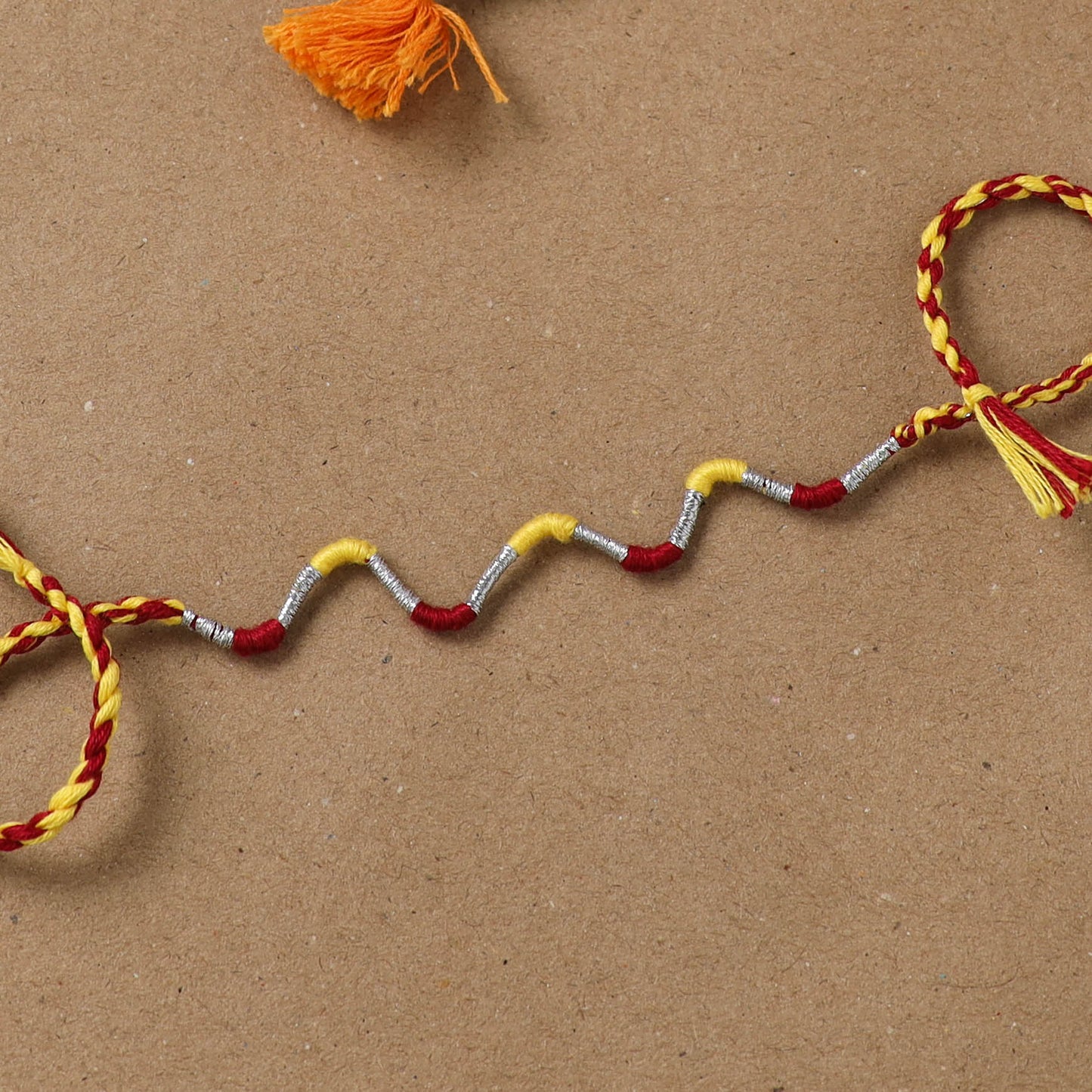 Anant Raksha Thread Work Rakhi with Soof Hand Embroidered Potli 31