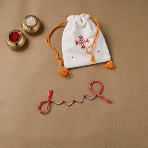 Anant Raksha Thread Work Rakhi with Soof Hand Embroidered Potli 32