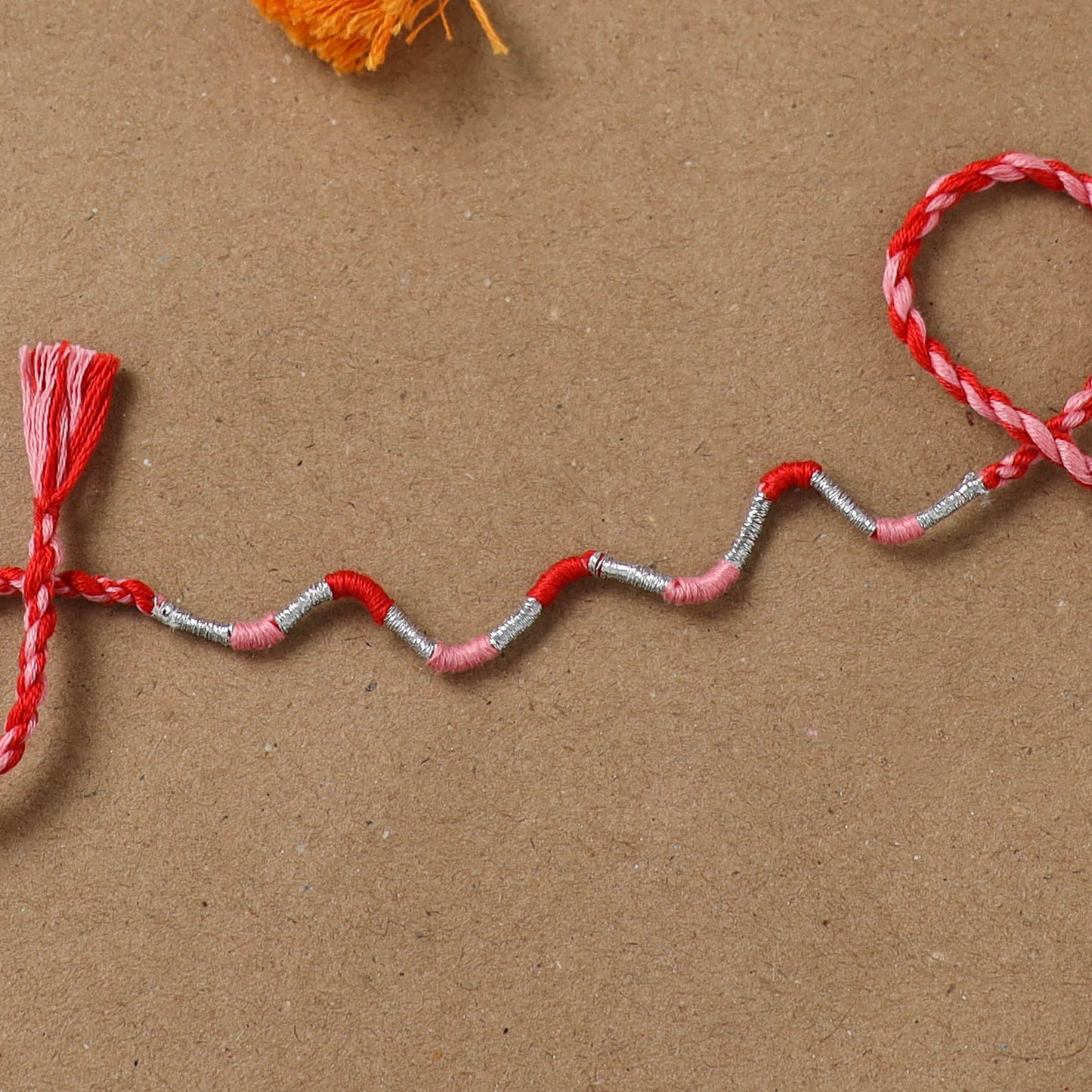 Anant Raksha Thread Work Rakhi with Soof Hand Embroidered Potli 32