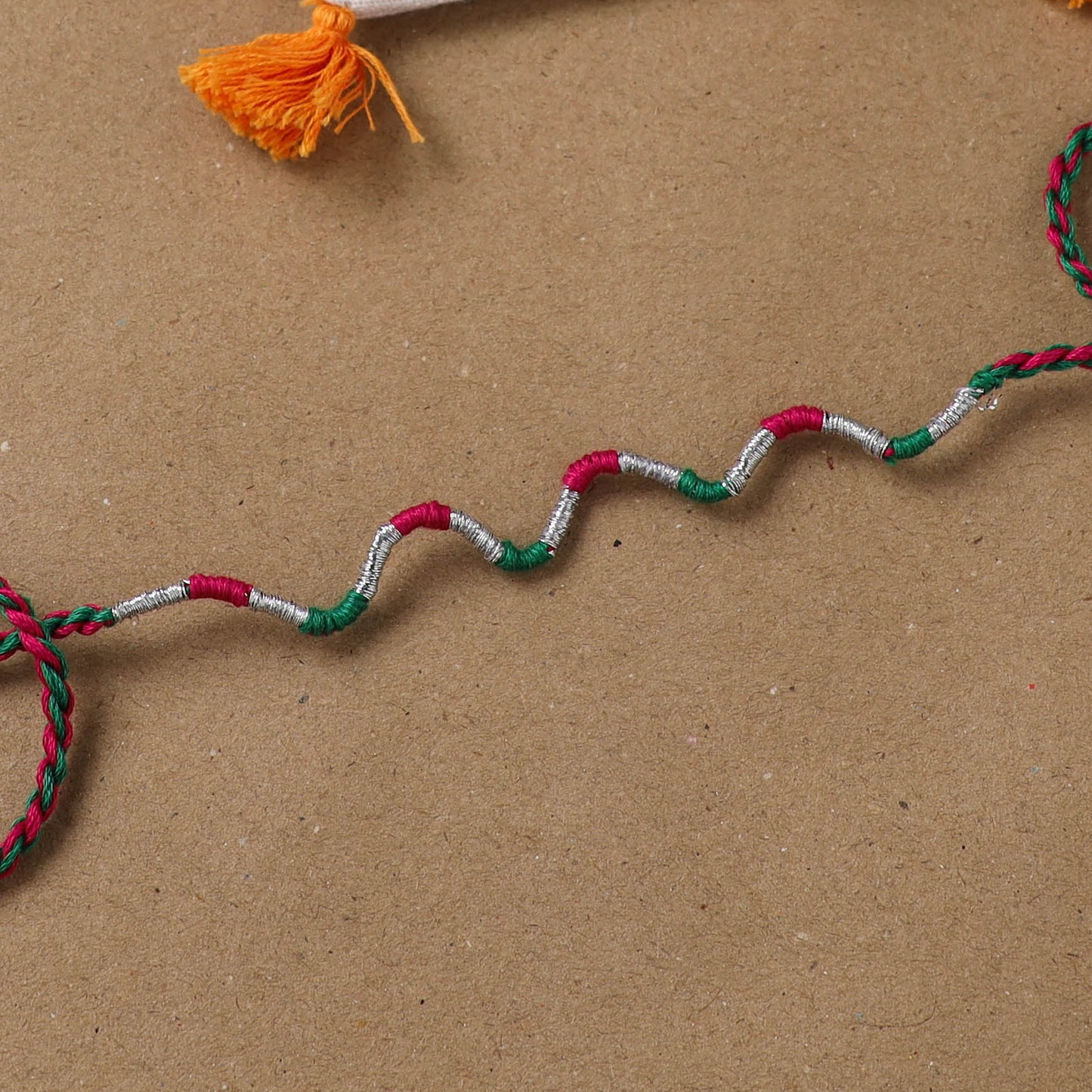 Anant Raksha Thread Work Rakhi with Soof Hand Embroidered Potli 33