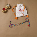 Anant Raksha Thread Work Rakhi with Soof Hand Embroidered Potli 34