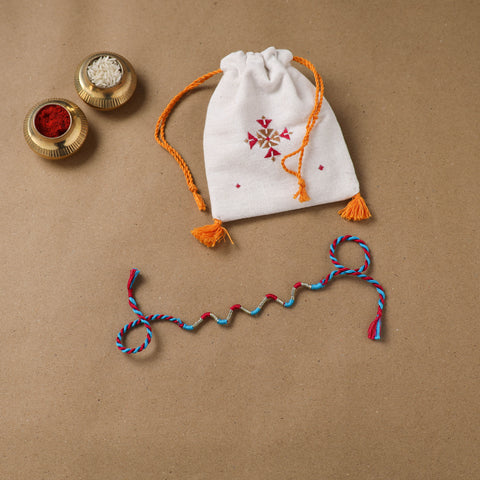 Anant Raksha Thread Work Rakhi with Soof Hand Embroidered Potli 34