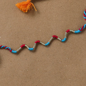 Anant Raksha Thread Work Rakhi with Soof Hand Embroidered Potli 34