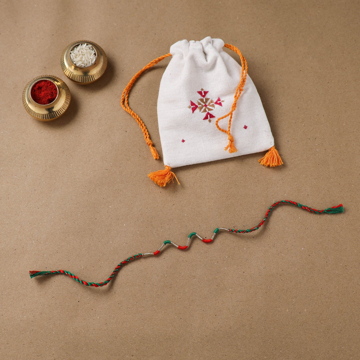 Anant Raksha Thread Work Rakhi with Soof Hand Embroidered Potli 35