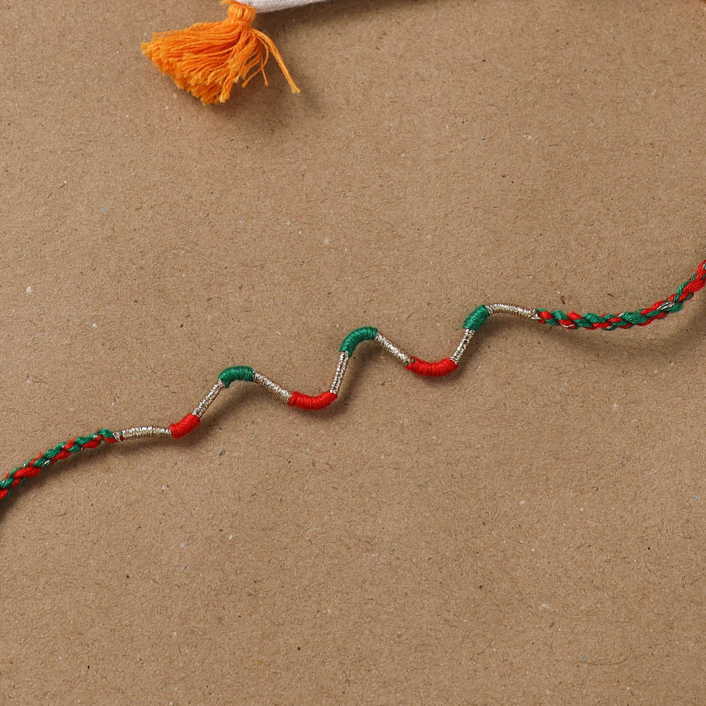 Anant Raksha Thread Work Rakhi with Soof Hand Embroidered Potli 35