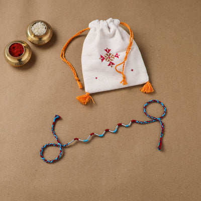 Anant Raksha Thread Work Rakhi with Soof Hand Embroidered Potli 37