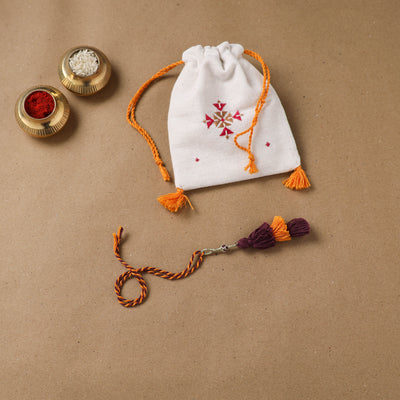 Anant Raksha Thread Work Lumba Rakhi with Soof Hand Embroidered Potli 38
