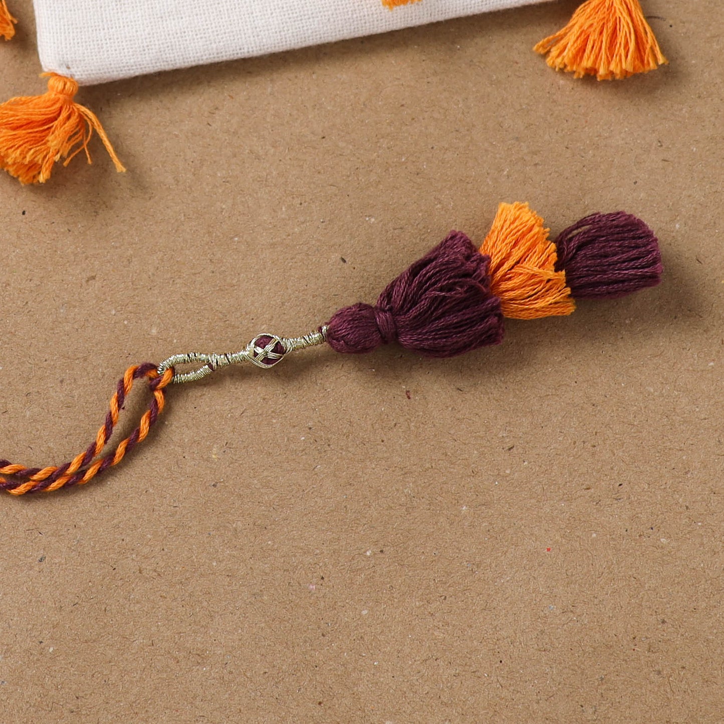 Anant Raksha Thread Work Lumba Rakhi with Soof Hand Embroidered Potli 38