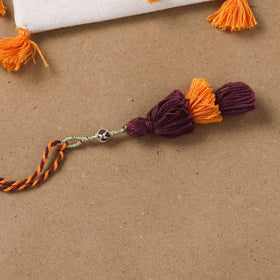 Anant Raksha Thread Work Lumba Rakhi with Soof Hand Embroidered Potli 38