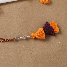 Anant Raksha Thread Work Lumba Rakhi with Soof Hand Embroidered Potli 39