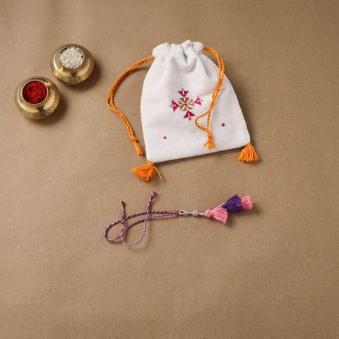 Anant Raksha Thread Work Lumba Rakhi with Soof Hand Embroidered Potli 40