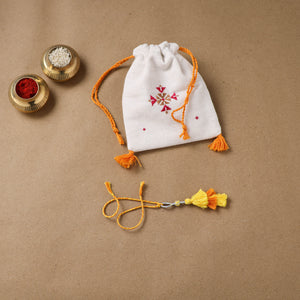 Anant Raksha Thread Work Lumba Rakhi with Soof Hand Embroidered Potli 43