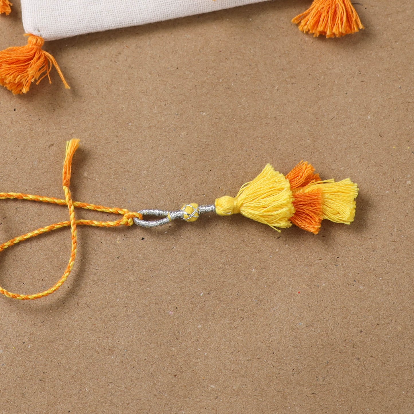 Anant Raksha Thread Work Lumba Rakhi with Soof Hand Embroidered Potli 43