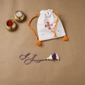 Anant Raksha Thread Work Lumba Rakhi with Soof Hand Embroidered Potli 44