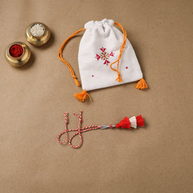 Anant Raksha Thread Work Lumba Rakhi with Soof Hand Embroidered Potli 45
