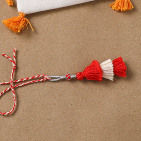 Anant Raksha Thread Work Lumba Rakhi with Soof Hand Embroidered Potli 45