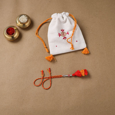 Anant Raksha Thread Work Lumba Rakhi with Soof Hand Embroidered Potli 46