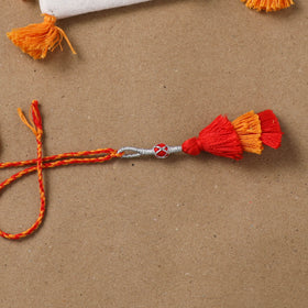 Anant Raksha Thread Work Lumba Rakhi with Soof Hand Embroidered Potli 46