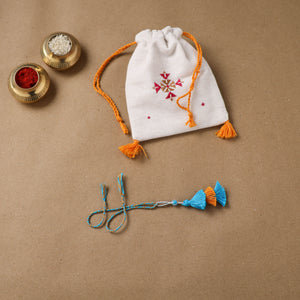 Anant Raksha Thread Work Lumba Rakhi with Soof Hand Embroidered Potli 47