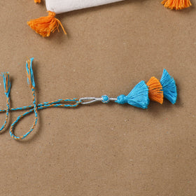 Anant Raksha Thread Work Lumba Rakhi with Soof Hand Embroidered Potli 47