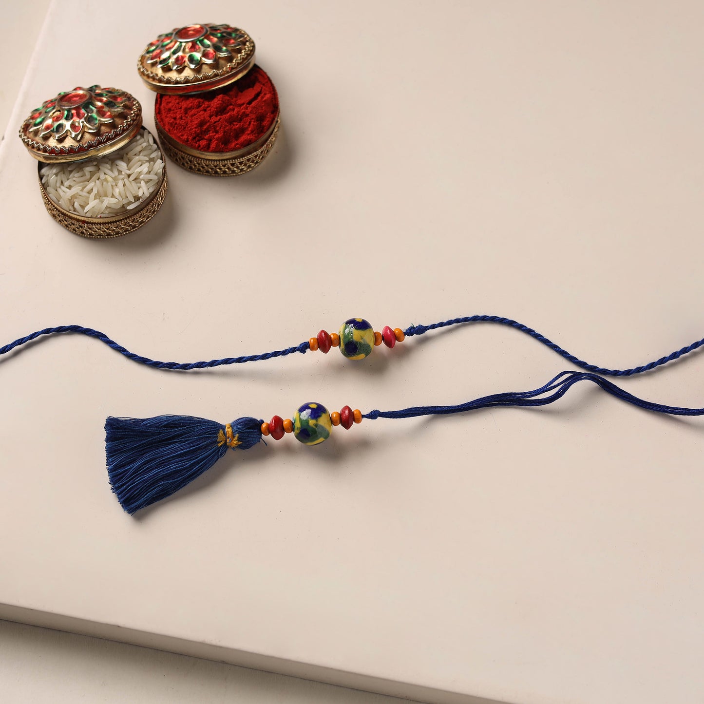 Handmade Blue Pottery & GS Bead Work Rakhi Lumba Set 29