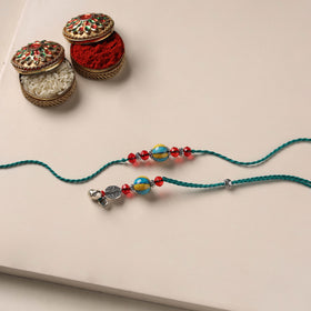 Handmade Blue Pottery & GS Bead Work Rakhi Lumba Set 32