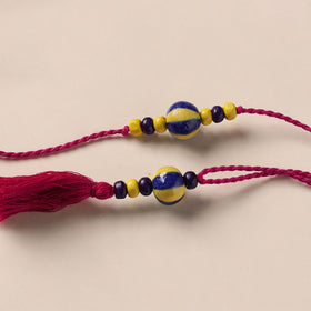 Handmade Blue Pottery & GS Bead Work Rakhi Lumba Set 34