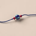 Handmade Blue Pottery & GS Bead Work Rakhi 01