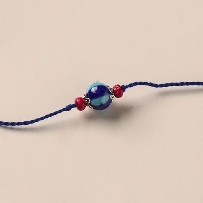 Handmade Blue Pottery & GS Bead Work Rakhi 01