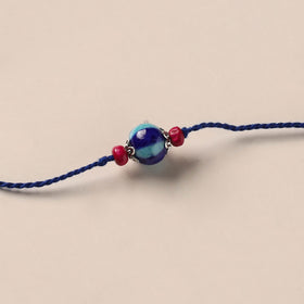 Handmade Blue Pottery & GS Bead Work Rakhi 01