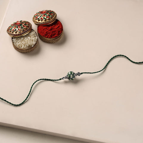 Handmade Blue Pottery & GS Bead Work Rakhi 02