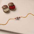 Handmade Blue Pottery & GS Bead Work Rakhi 03