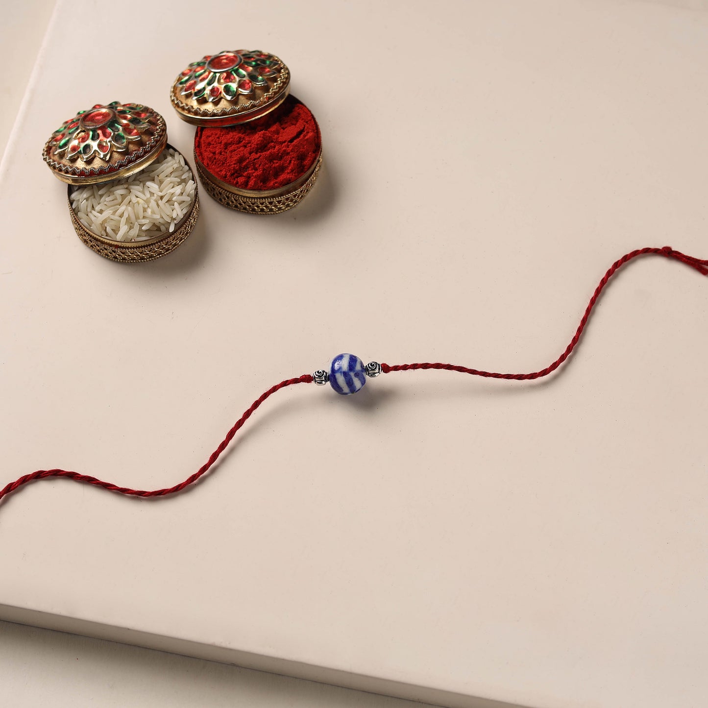 Handmade Blue Pottery & GS Bead Work Rakhi 04