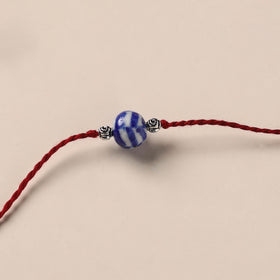 Handmade Blue Pottery & GS Bead Work Rakhi 04